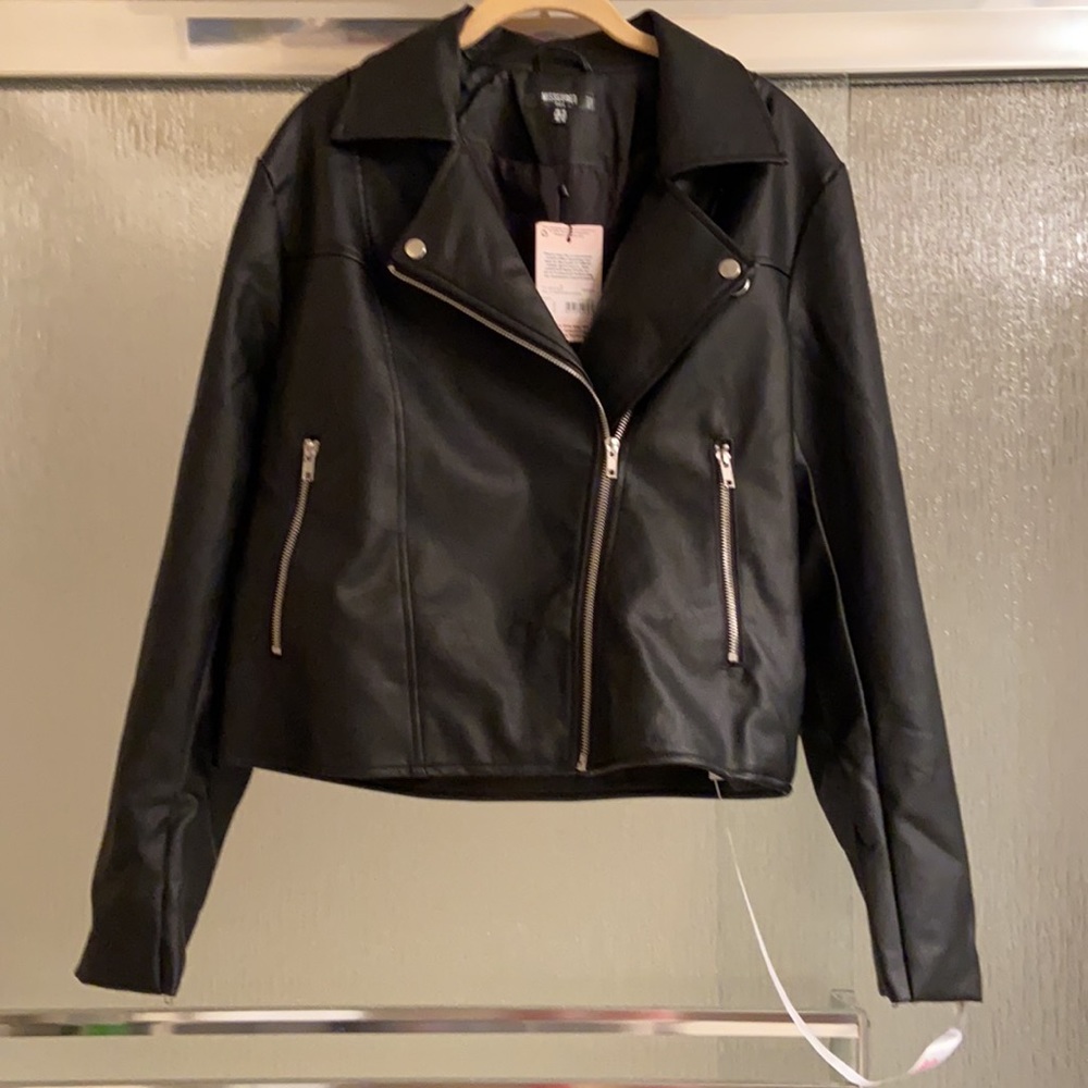 🛑 Missguided size 10 large Brand new. Black leather jacket. Never worn.